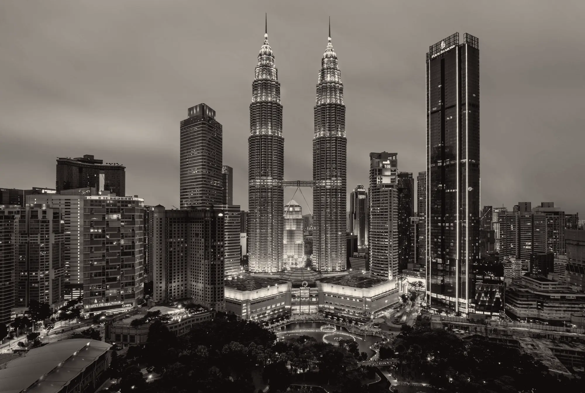The Petronas Towers and Kuala Lumpur skyline at dusk